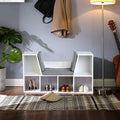 Storage shelf with seat and cushion